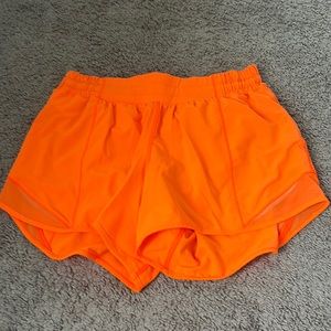 lululemon hotty hot low rise 4” shorts, neon orange, size 6